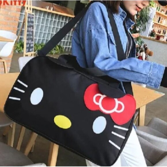 Hello Kitty Black Travel Duffel Bag With Red Bow & Adjustable Strap By Sanrio - Picture 3 of 6